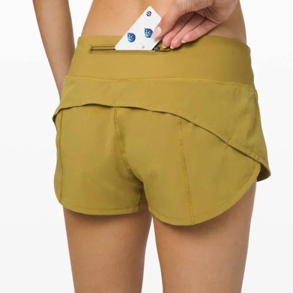 LuLu Lemon speed up low rise lined running workout shorts in yellow green